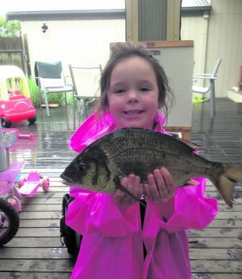Kiahna shows dad how it’s done with this fine bream.