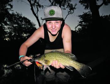 Hugh Blythe with his first-ever Murray cod caught on a surface lure. Hugh caught two on the surface that night. These fish were caught in the dying days of summer in the King River. 