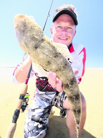 Walking the flats licking soft plastics can lead to some impressive flathead being caught in the summer months.