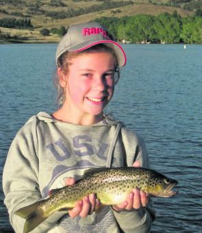 Amarnie Mcvean with a brown caught trolling on Lake Jindabyne with a Rapala CD 7 in rainbow trout pattern.