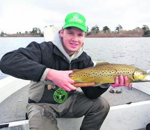 Marc Ainsworth gets in to the action at Tooliorook with a fat 1.6kg brown trout taken on a hardbodied lure.
