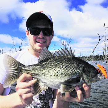 Local gun Jarrod Potter with a Bass that fell victim to a trolled Stumpjumper at Rocklands Reservoir.