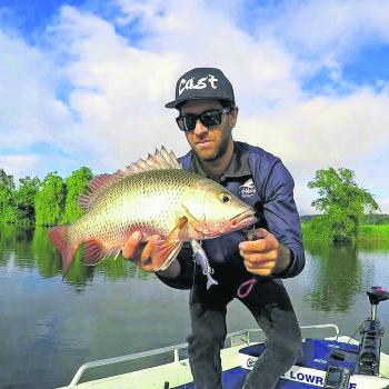 Shane Adams with a healthy winter jack.