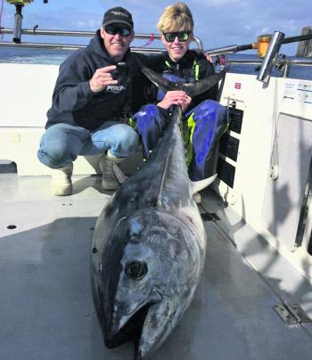 Brett Sharp and his son Adam with a nice southern blue.