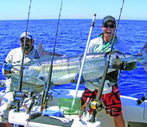 Shaun Manthey with a black marlin caught on Capricorn during March.
