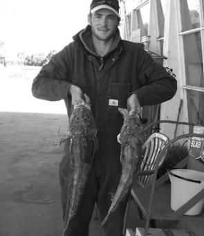 Andrew Ward with two terrific flathead caught inside at Port Albert.