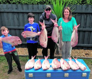 The Methers family with their bag of Top End snapper.