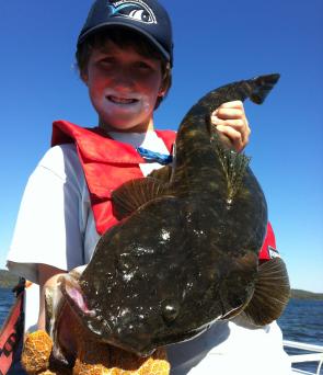 Nick Gulaj released his first fish on a lure, this cracking 83 cm flathead.