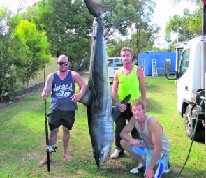 Croft, Juzzy and Jimmy Chow display their solid Bass Strait mako.