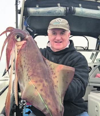 Pat Ellaby with a weapon of a Quail Bank calamari. 
