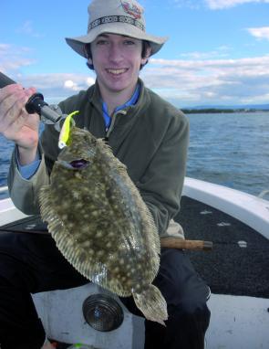 An unusual catch – a flounder hooked on a soft plastic.