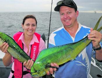 Nicki and James with a pair of cracker mahimahi that were kept for the table.