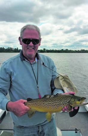 Garry McKay with brown trout he caught while flyfishing Lake Wendouree (photo courtesy of Garry McKay).