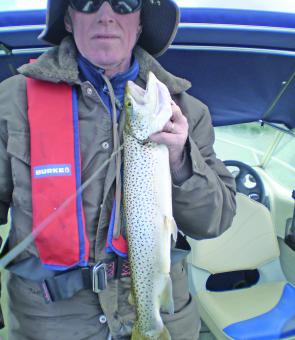 Michael Weedon landed this sensational Purrumbete brown trout of just under 2kg recently. (Photo courtesy Garry Drew)