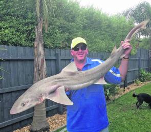Gavin Methers holds a cracking 16kg gummy shark from Western Port’s murky Waters. Fish of this calibre are a viable catch throughout winter.