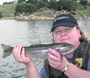 Regular Jindabyne angler Amanda Walshaw with a nice rainbow caught trolling a Rapala Brown Trout Scatter Rap.