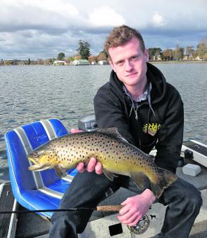Cam Griffin shows how fat the fish have become in Lake Wendouree with the explosion in smelt numbers. 