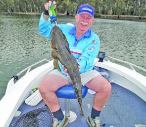 The author with an 80cm flathead caught while chasing bream in St Georges Basin.