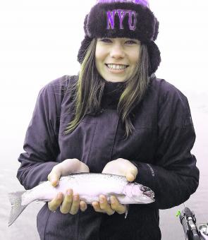 Nina Kettle keeps warm with this rainbow on a nippy morning. 