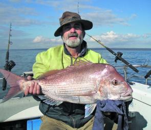 Tony Dalla Rossa with a cracking 7kg snapper taken on the bottom of the tide.’