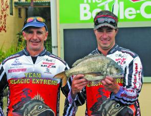 Stephen Bacon and Dion Vale from Team Monster Fish display the 1.64kg bream that handed them the Eco-Gear Big Bream Prize.
