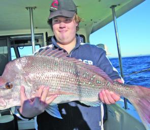 A 7kg North Reef snapper taken on a fishing offshore Noosa charter.
