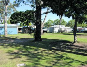 Camp sites are on level, well grassed, areas and are complete with handy shade. 