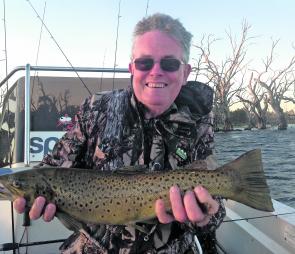 Perth visitor Tom Adams was delighted with one of his brown trout landed at Toolondo.