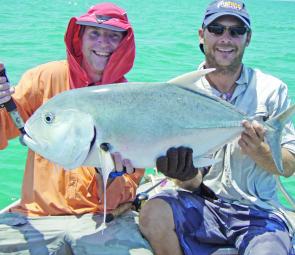 Casting poppers around shallows reefs produces the goods for December.