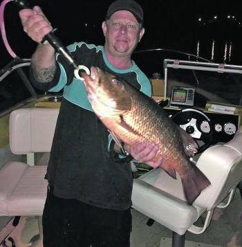 Mark James with over 60cm of jack caught on a live bait at Boyds Bay Bridge.