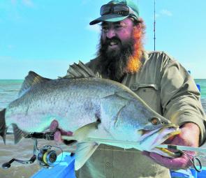 Justin Powell with a nice lure-caught barramundi.