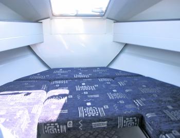 Bunks with storage under them offer room to stretch out, escape the elements, or simply take care of valuable tackle. 