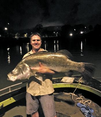 Cortney Meiers with his PB 123cm barra landed in the Gladstone marina.