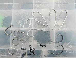 A selection of hooks for pearl perch with live bait and dead. The author generally runs a small J-hook on one dropper and a small circle on the other. Smaller hooks bed in the jaw, while bigger hooks wear a hole in the soft tissue behind the jaw and can w