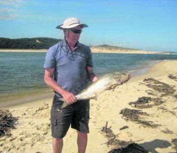 Local tailor looking about the size of a cricket bat!