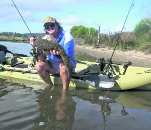 The author with a 70cm Wallaga flathead caught from a tandem Hobie kayak, which adds another dimension to his guiding service.