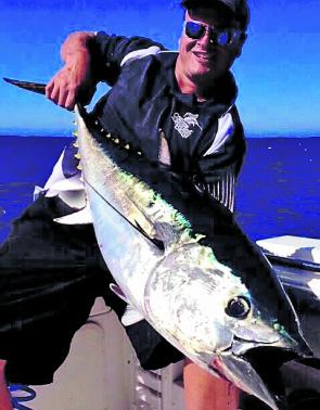 Skipper of the Hunter III, Julian Dickeson with a great early season Port Mac school fish.