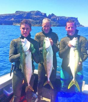 Peter and Mac Riddle with Craig Fox holding some nice Julia Percy Island kingfish.