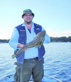 The author recommends that those still wary of soft plastics should try them on flathead in Lake Macquarie this month.