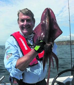Gary Gregg with a southern calamari jigged outside South Head.