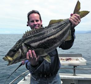 St Helens charter operator Rocky Carosi with a large striped trumpeter.
