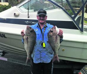 Jeff Stenhouse with two Hunter Coast snapper. Fish like these should be available on the reefs until late October and maybe even longer. Pilchards, yellowtail, mullet strips and lures all work.