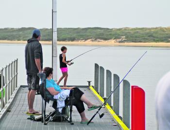 The jetty at the Marlo boat ramp is a popular place for families to relax and have a fish.
