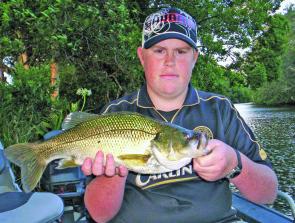 Bob Fairbairn with a chunky Clarence River bass. These fish will be gorging themselves on cane beetles over the next few months, so time to dust off those little blue/green iridescent Bill's Bug fizzers.