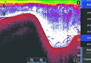 This Lowrance Touch sounder shot shows bass holding in a submerged creek bed at Lake St Clair. Note the 83Hz frequency that uses a 60° cone area to show more fish than the 200Hz 20° cone. The water at 25’ was 2° cooler than the surface. 