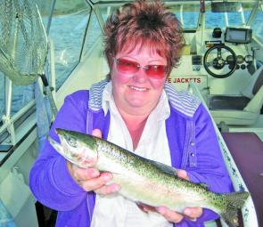 Yvonne Deegan, of Lavington, trolled up this rainbow trout with a Steve Williamson black-orange Tasmanian Devil.