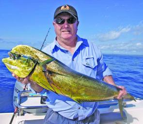Ken MacDonald with one of the many mahi mahi that have been adding variety and a whole lot of fun to the catch offshore recently.