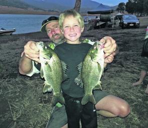 Greg Eslick and son Jasper at St Clair with a brace of bass.