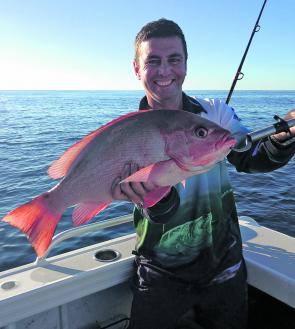 Aaron Lewis with a 69cm nannygai caught locally.