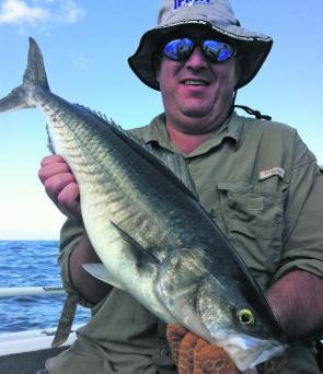 Steve Brammall with 70cm of salmon that did a fair kingfish impersonation.